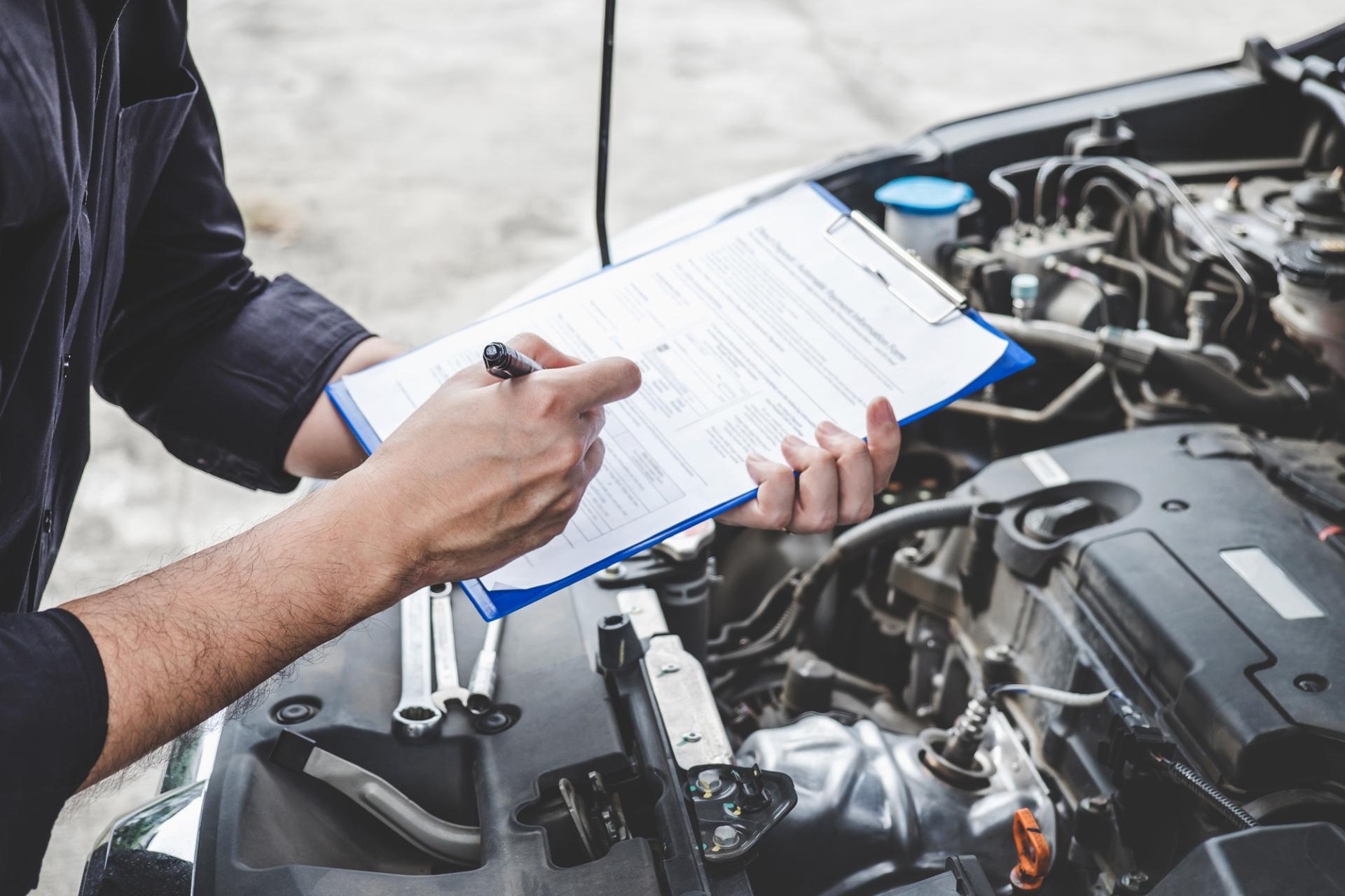 Mechanic-diagnosing-car